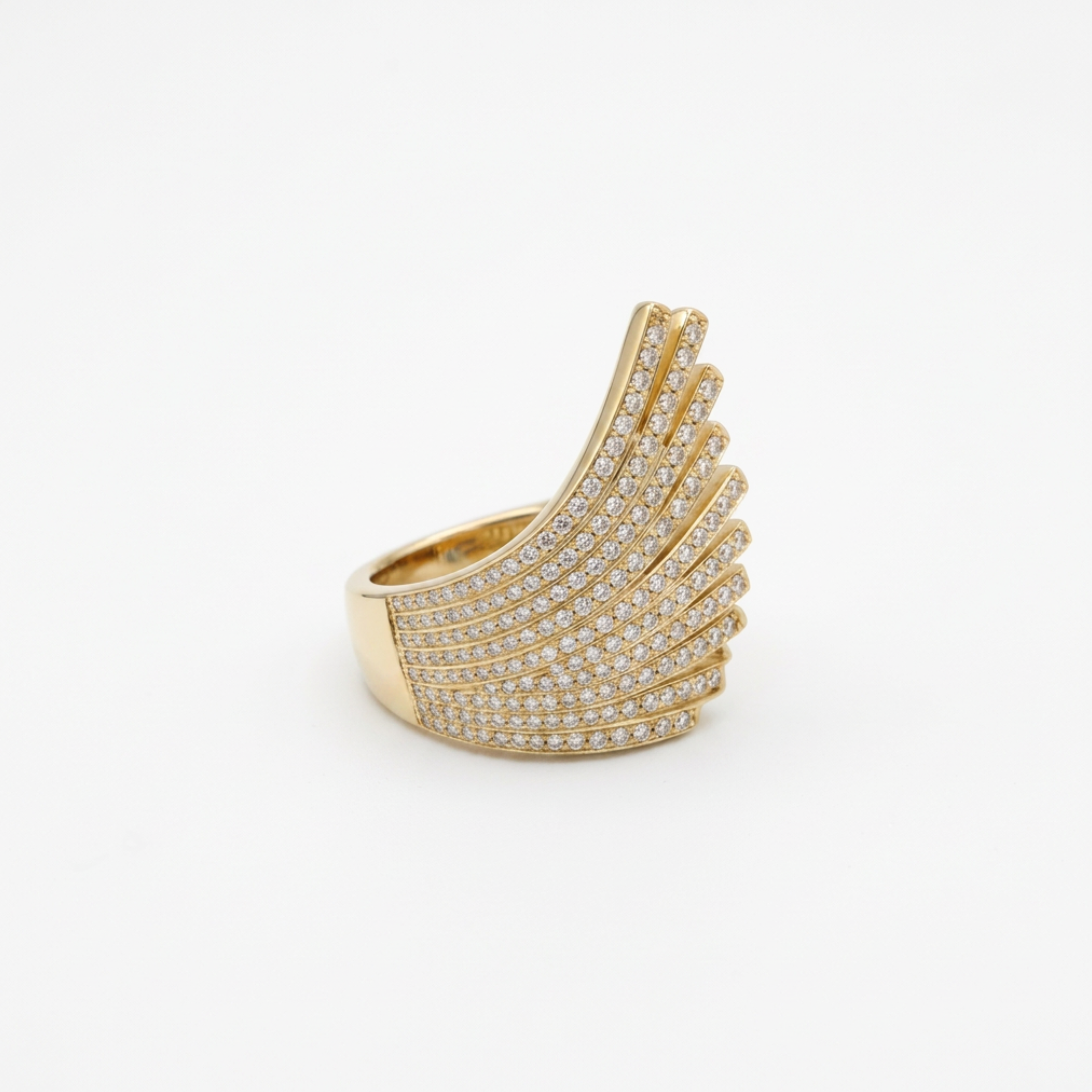 Anillo Bellini dorado alas